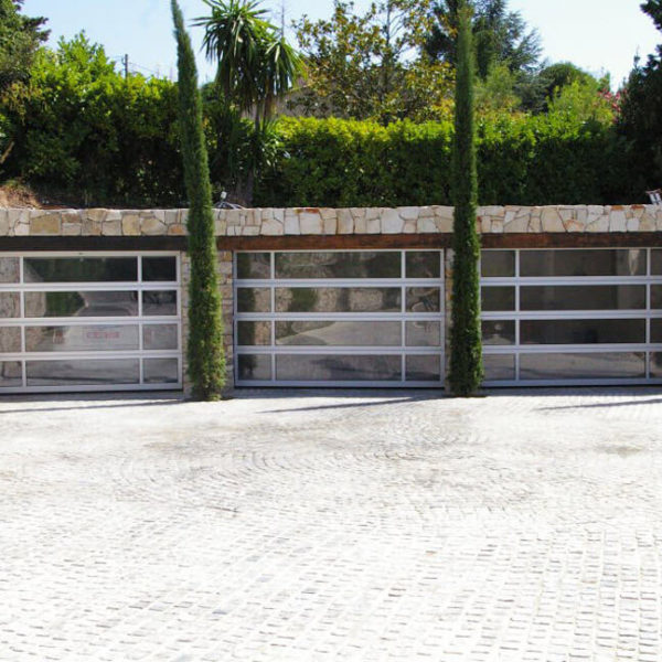 Three garages with glazed doors