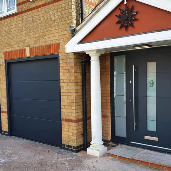 Front door with custom 'etched-effect' glazing and a letter-plate