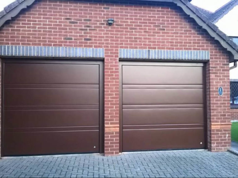 "Toprib' design garage doors in a metallic finish