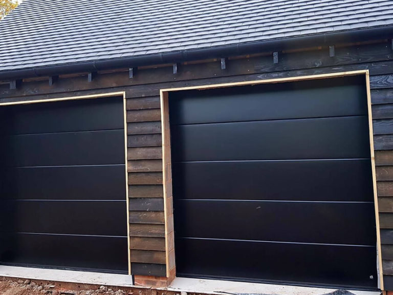 "Flush-slick' design garage doors