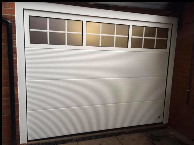 'Microrib' design garage door with top glazed panel