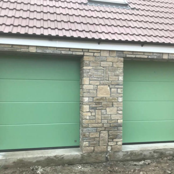'Flush' design & Chartwell green colour garage doors