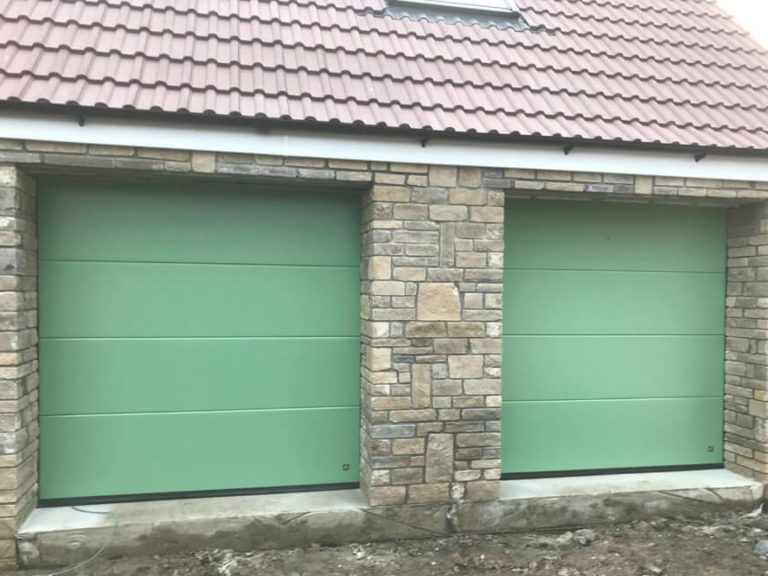 'Flush' design & Chartwell green colour garage doors