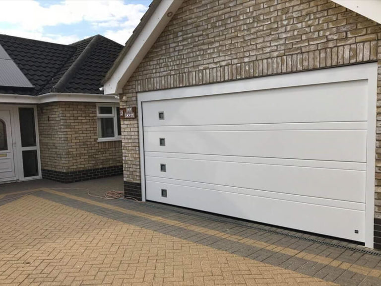 'Toprib' design sectional garage door with windows