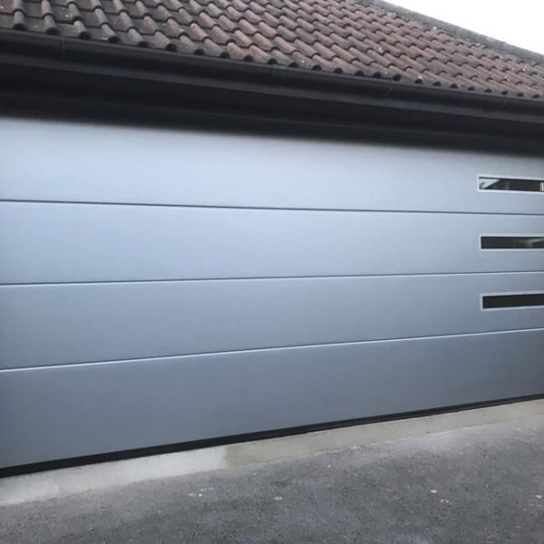 Garage door with oblong windows