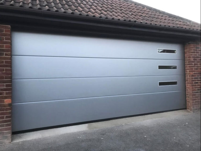 Garage door with oblong windows