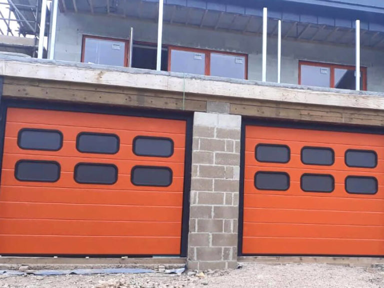 Garage doors with oval PVC windows