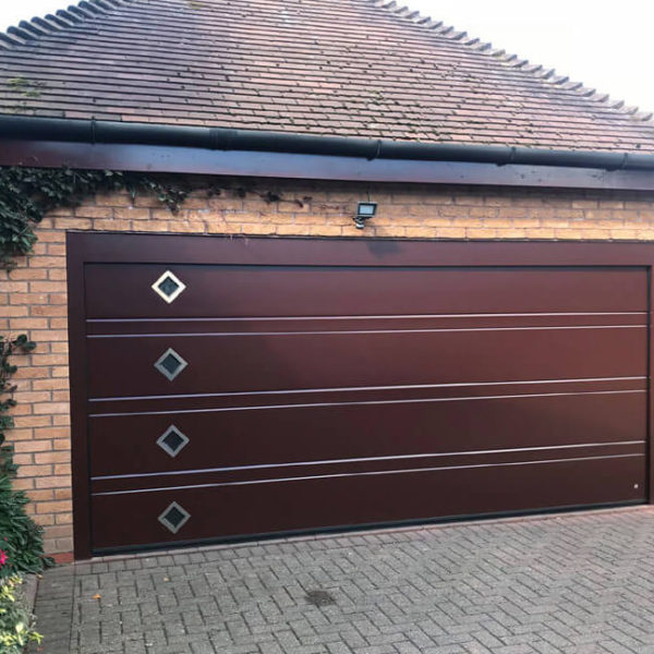 Garage door with diamond shape windows
