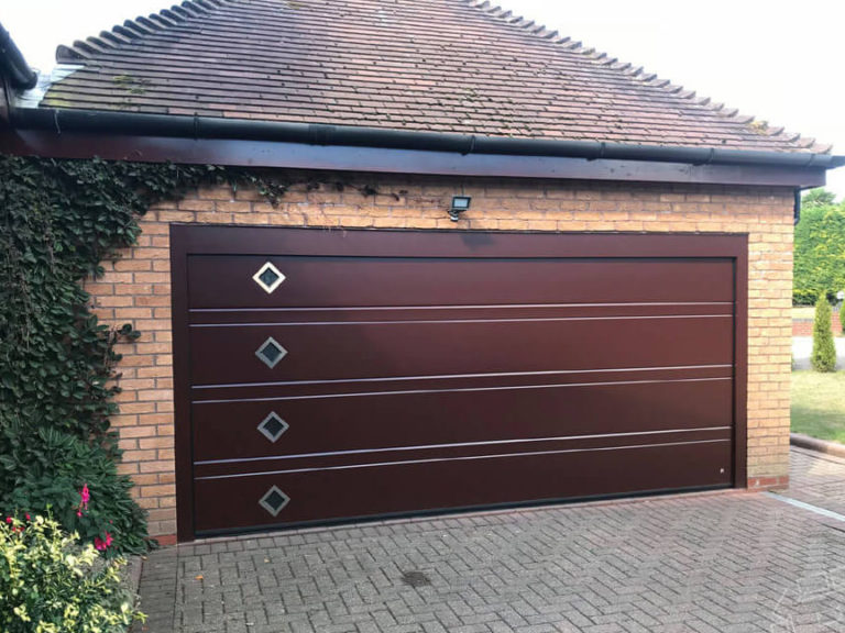 Garage door with diamond shape windows