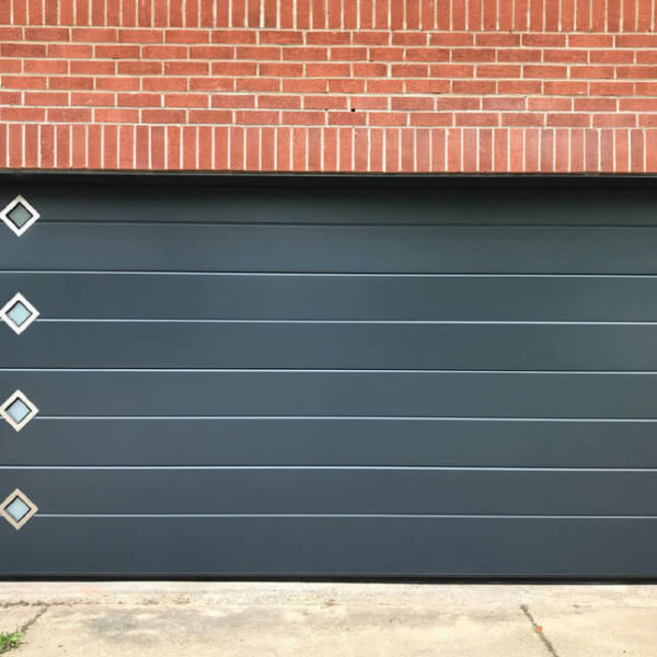 Garage door with diamond shape windows