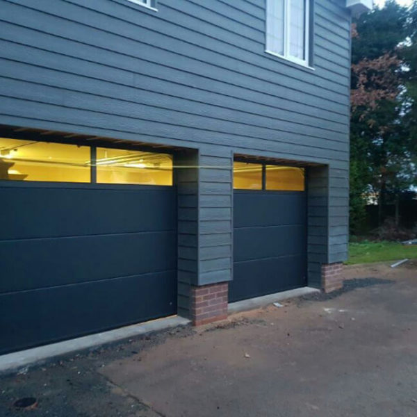 Sectional garage doors with transom style glazing