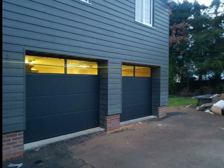 Sectional garage doors with transom style glazing