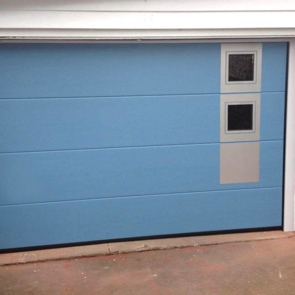 Garage door with applique & windows