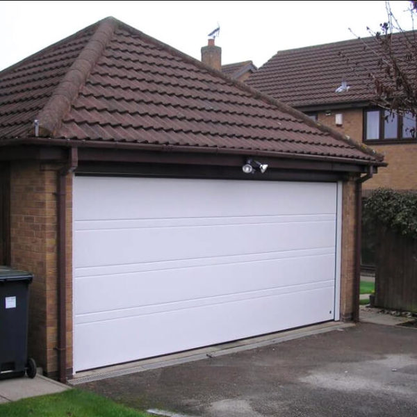 White 'Toprib' sectional garage door