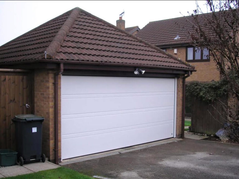 White 'Toprib' sectional garage door