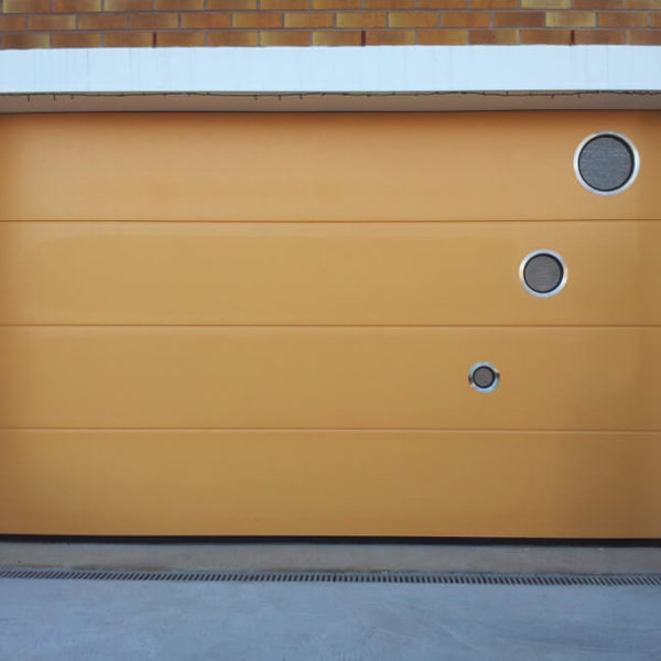 Garage door with custom window layout
