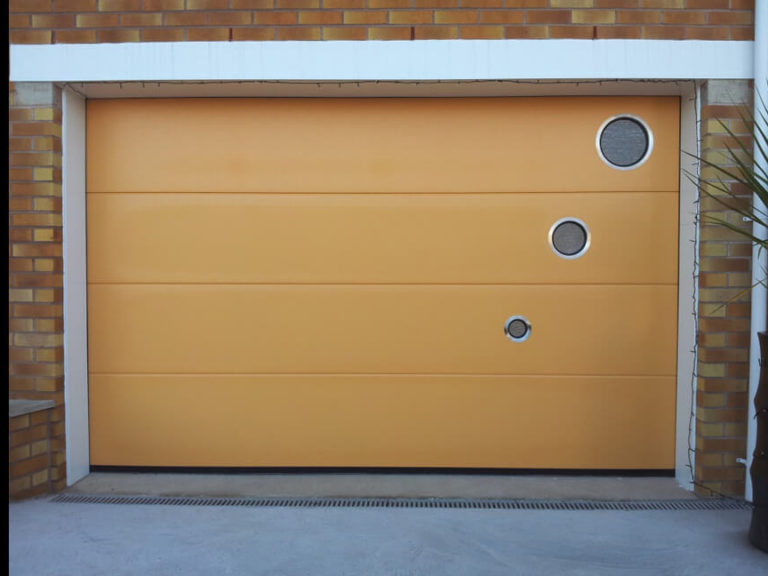 Garage door with custom window layout