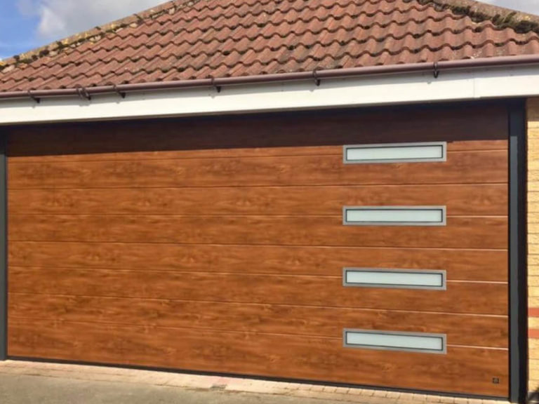 Garage door with oblong windows