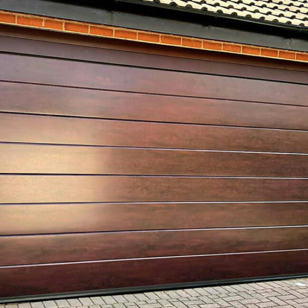 Sectional garage door with aluminium frame