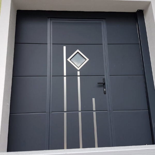 Sectional garage door with wicket & decor