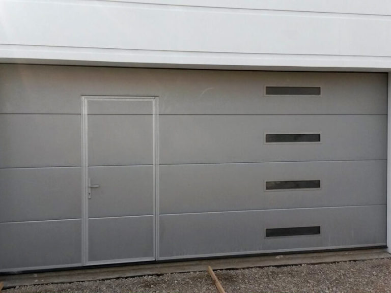 Sectional garage door with wicket & oblong windows