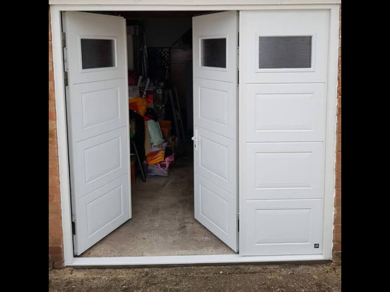 Inwards opening Side-Hinged Garage Door with bi-folding leaf