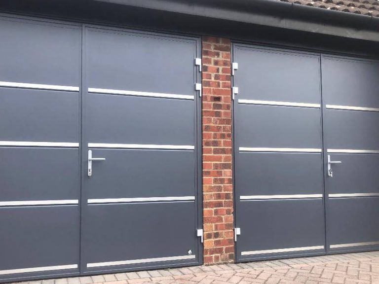 Side-Hinged Garage Doors with stainless metal decor details