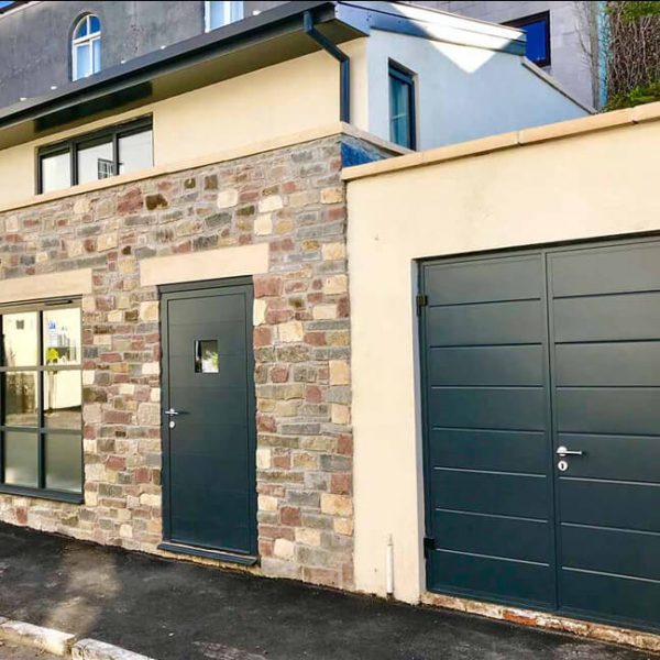 Side-Hinged Garage Door made to match overall house design
