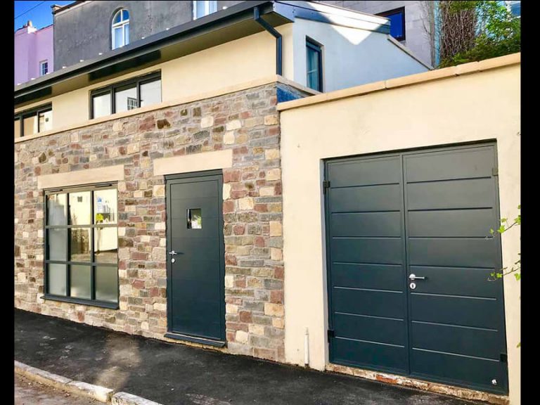 Side-Hinged Garage Door made to match overall house design