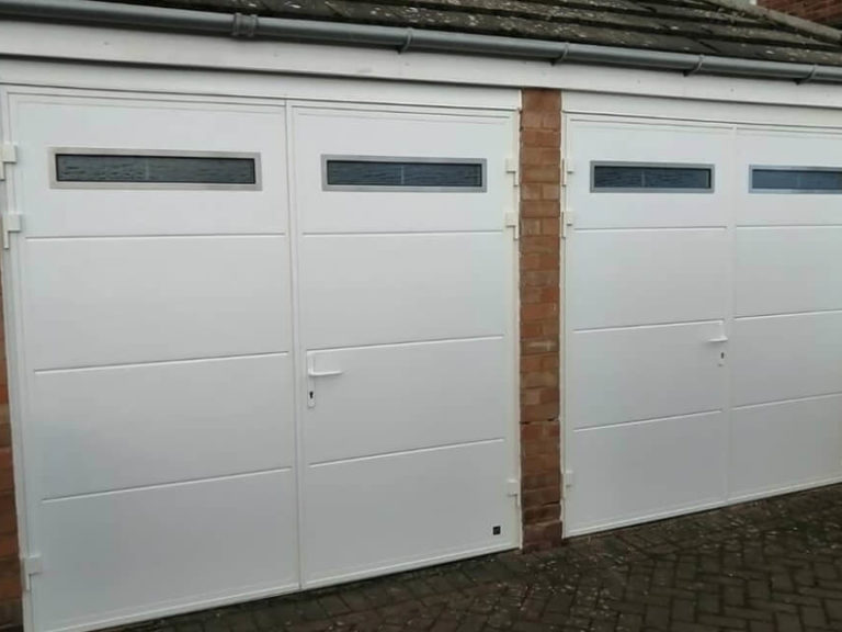 A pair of side hinged doors with oblong windows