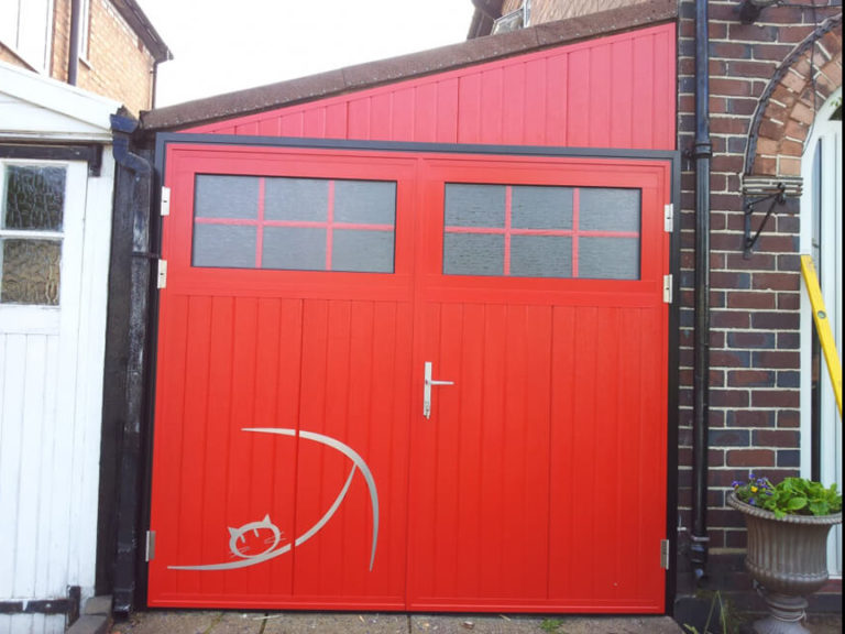 Side hinged door with triangular fascia panel