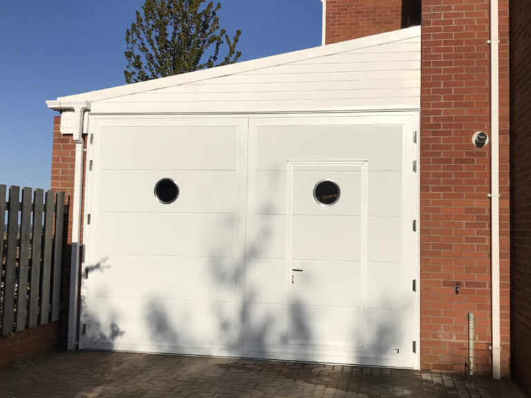 Side hinged door with wicket