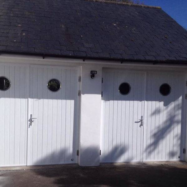 A pair of side hinged doors with portholes