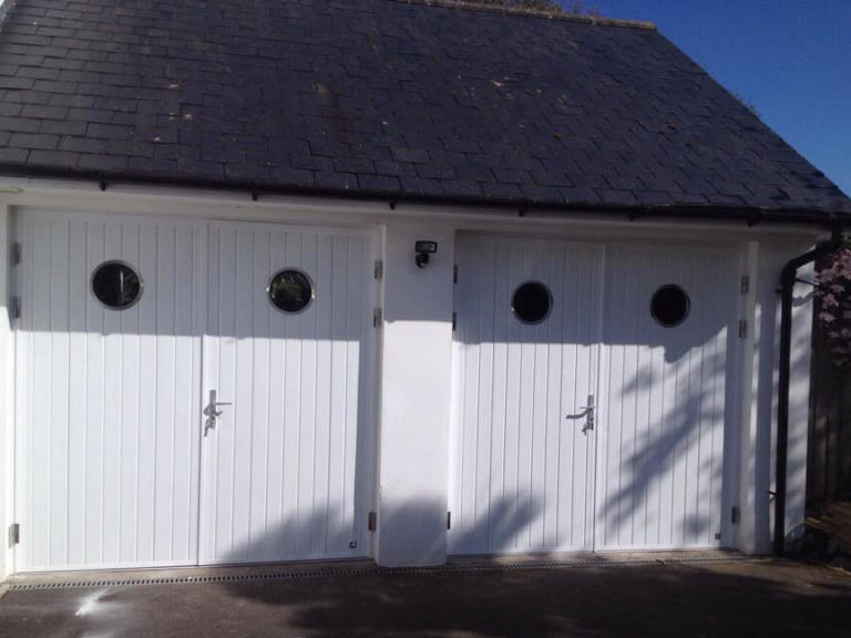 A pair of side hinged doors with portholes