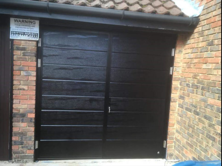 Side hinged garage door in black