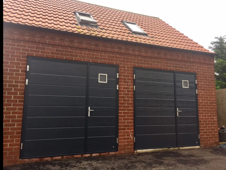 A pair of side hinged doors with square windows