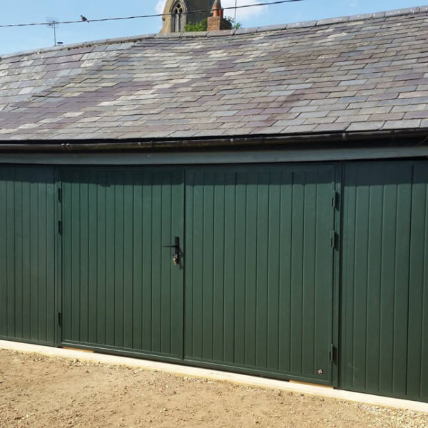 Side-hinged door with side fascia panels