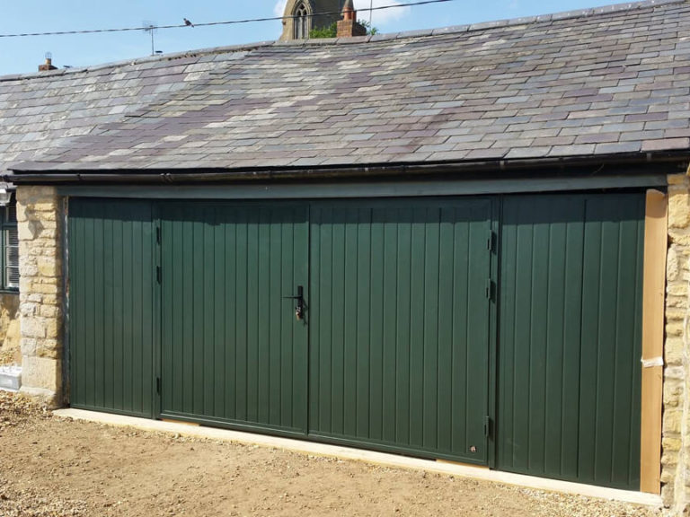 Side-hinged door with side fascia panels