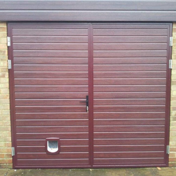 Side hinged door with pet-flap