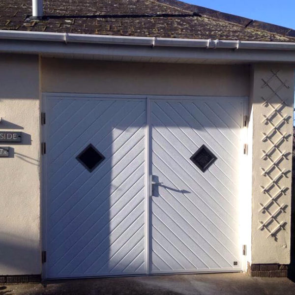 Side hinged door in chevron layout