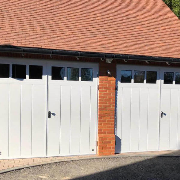 A pair of side hinged doors wit BS glazing