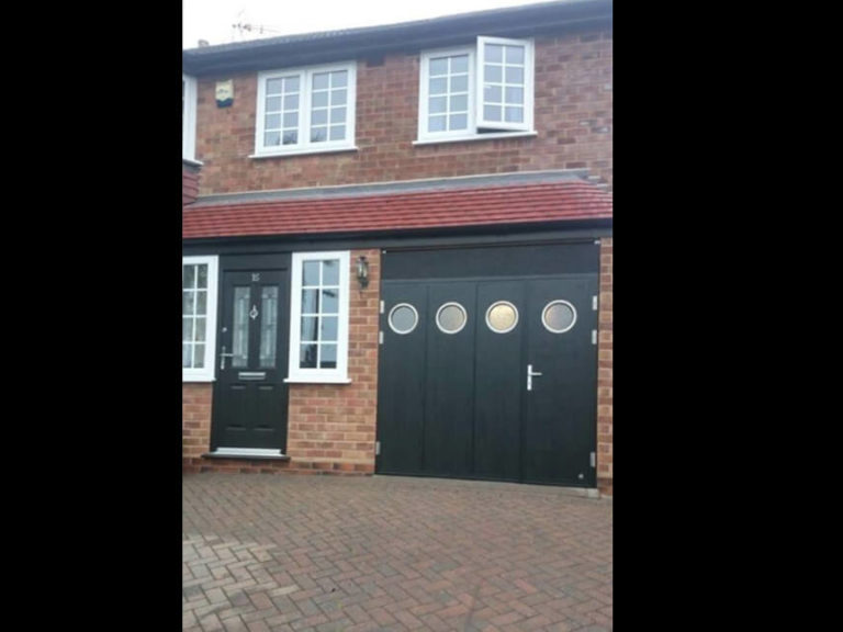 Side hinged door with portholes