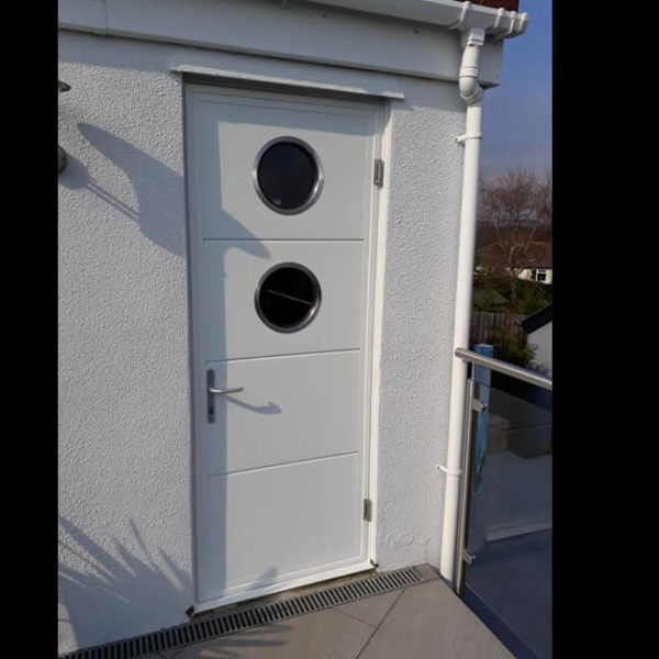 Side door with portholes