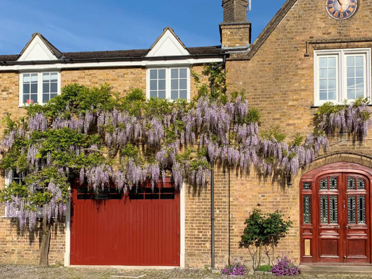 New side-hinged door matching old house style
