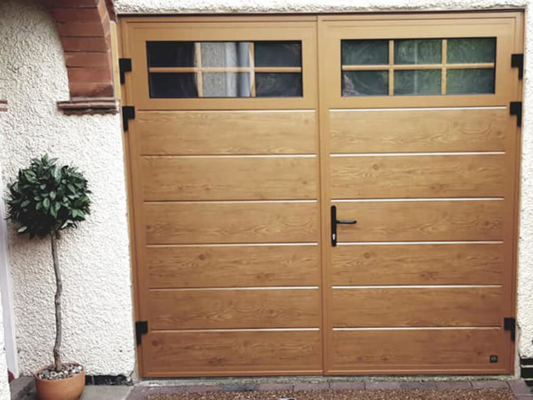 Traditional design side hinged garage door