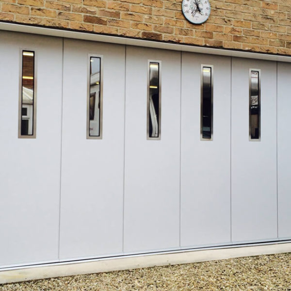Sliding garage door with oblong windows