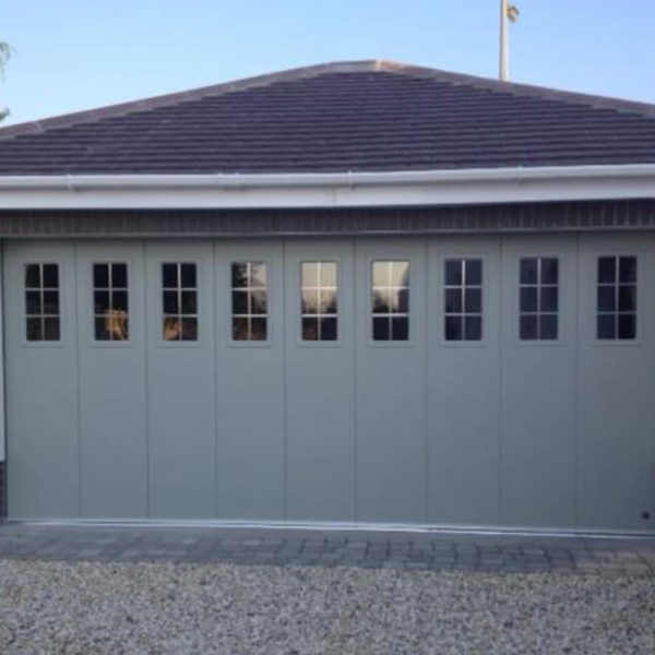 Garage door with PVC windows & 'lead-stripe' decor