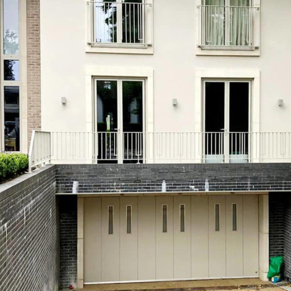 Private underground parking with side-sliding garage door