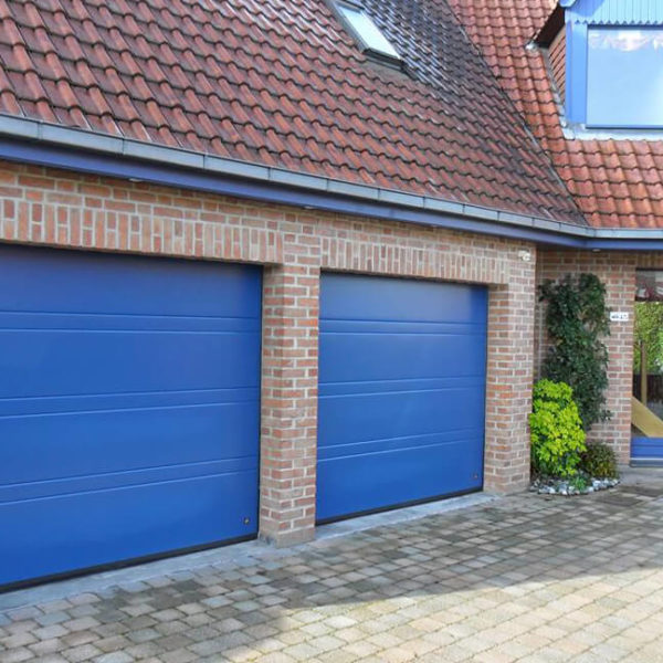 Custom blue door finish matching the house details