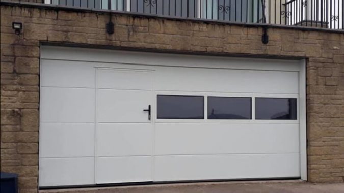 wicket Sectional garage door with wicket & half-glazed panel